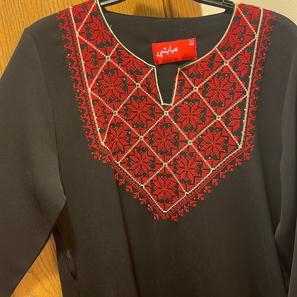 Jordanian red and black abaya. Only worn twice. Size 4 aka XL. Selling for $30.